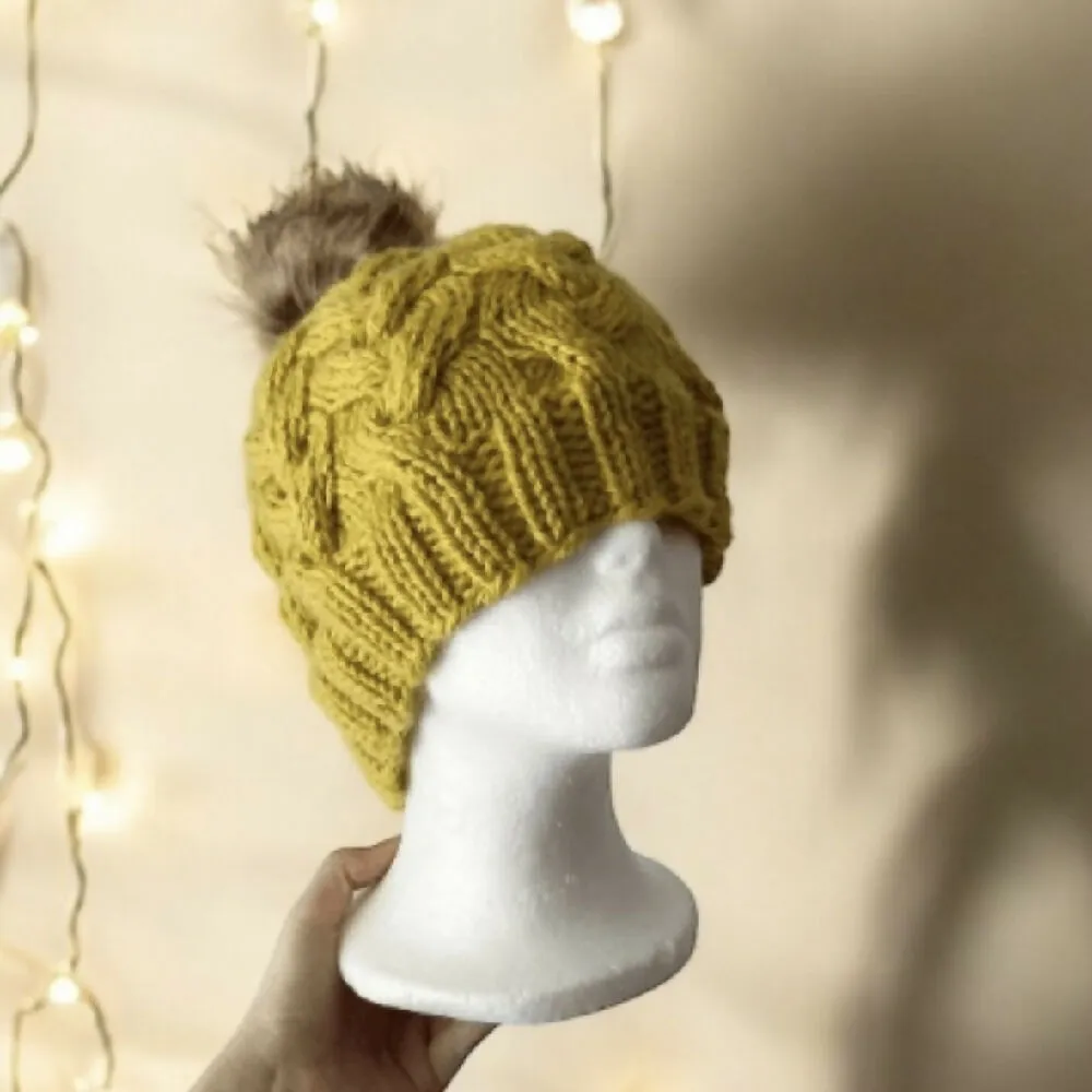 Cable hand Knit Chunky Beanie in Mustard yellow with brown fur pompom